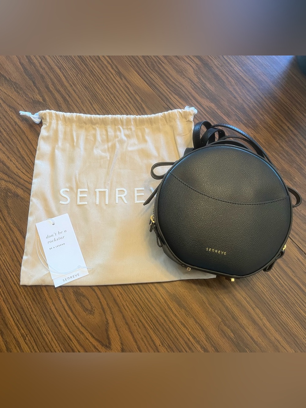 SENREVE Circa Round Circle Crossbody Bag in Noir Black with Gold Hardware